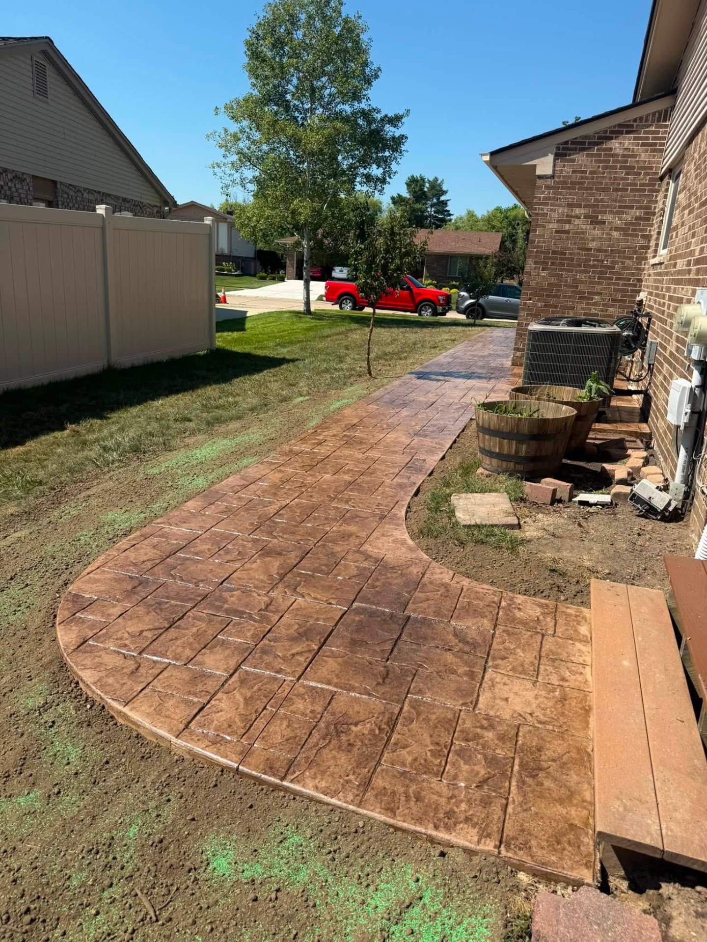 Canton project — curved stamped concrete walkway
