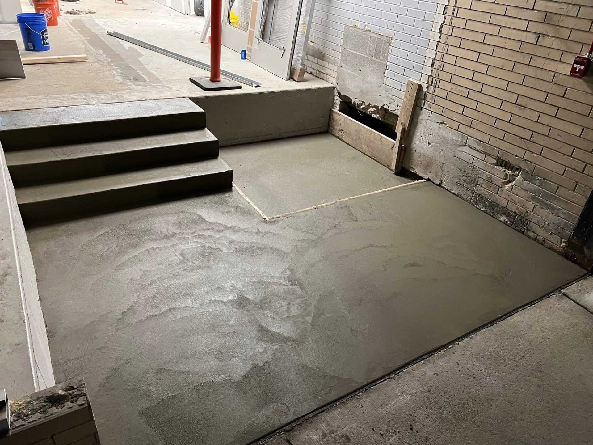 Wheelchair lift concrete pad and steps