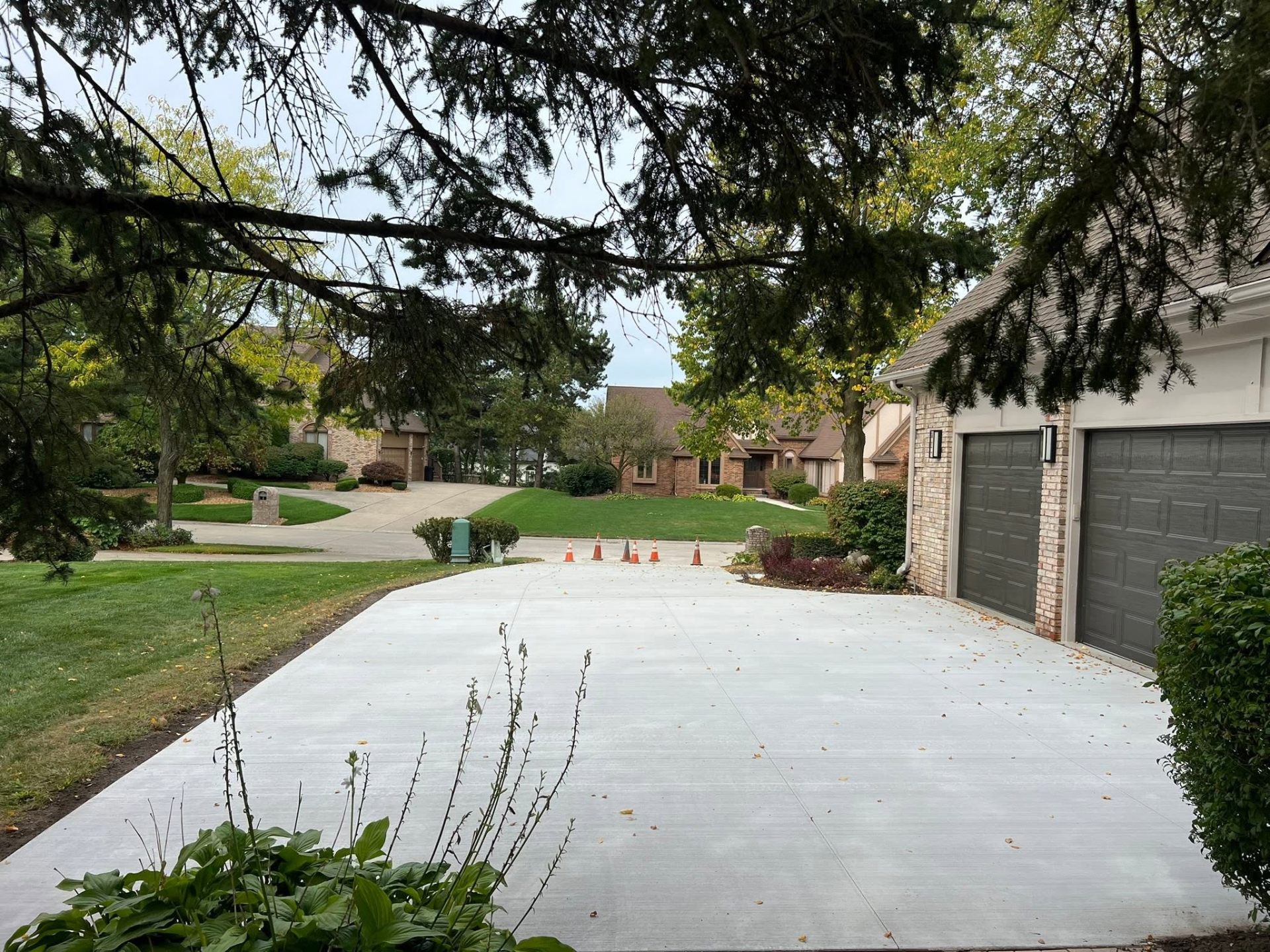 Wide view of the completed Plymouth driveway from the street