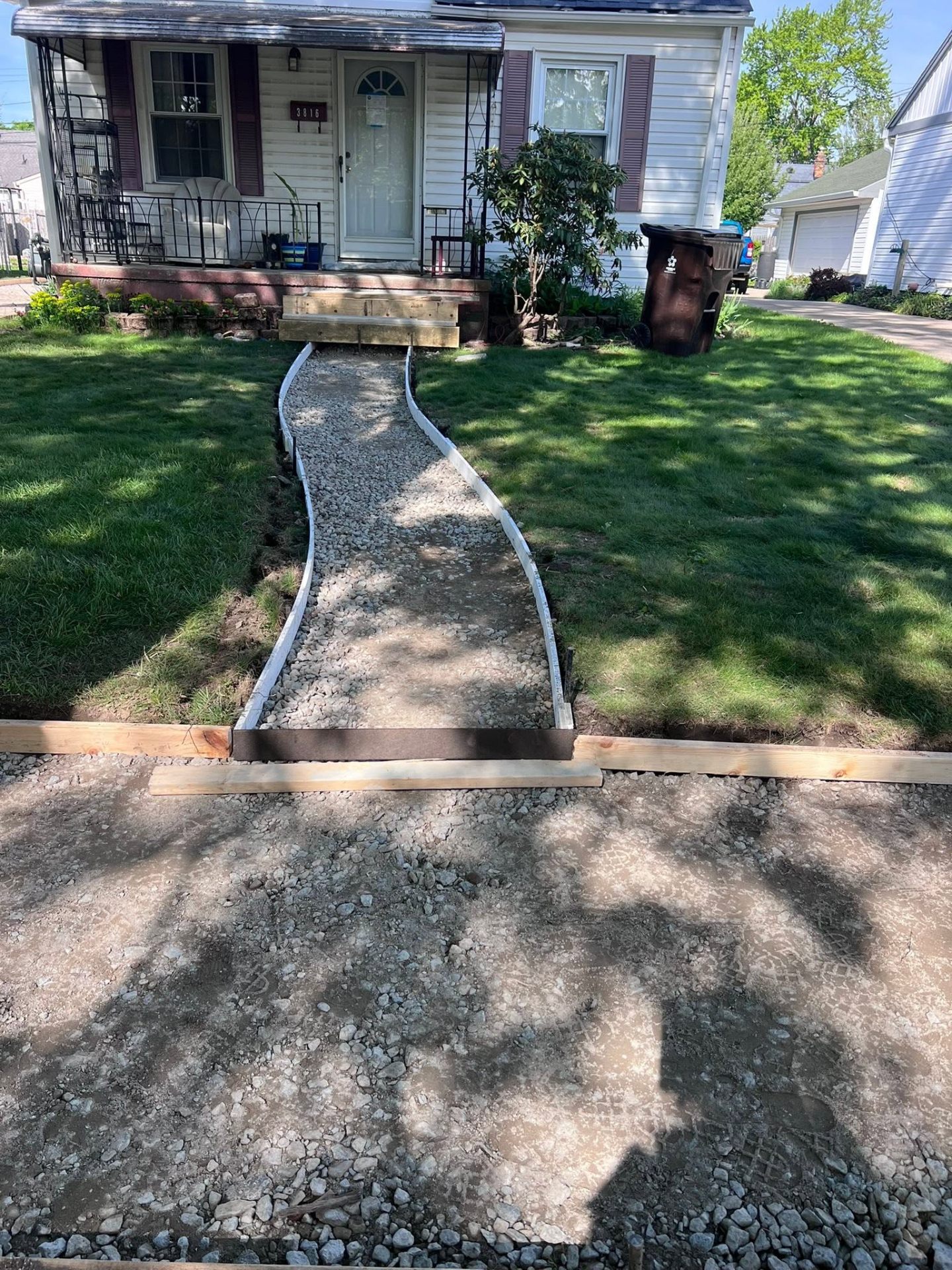 Curved walkway forms staged before the concrete pour