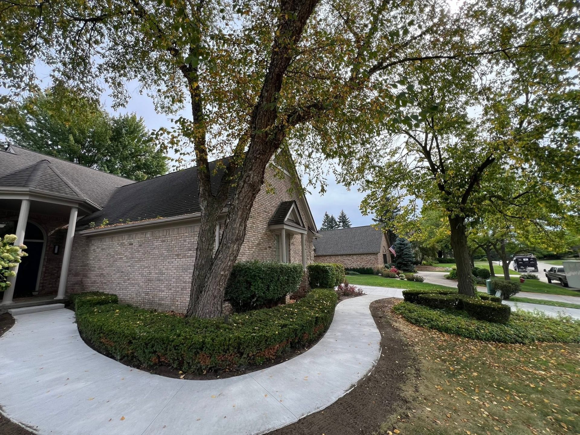 Completed walkway wrapping the side of the Plymouth home