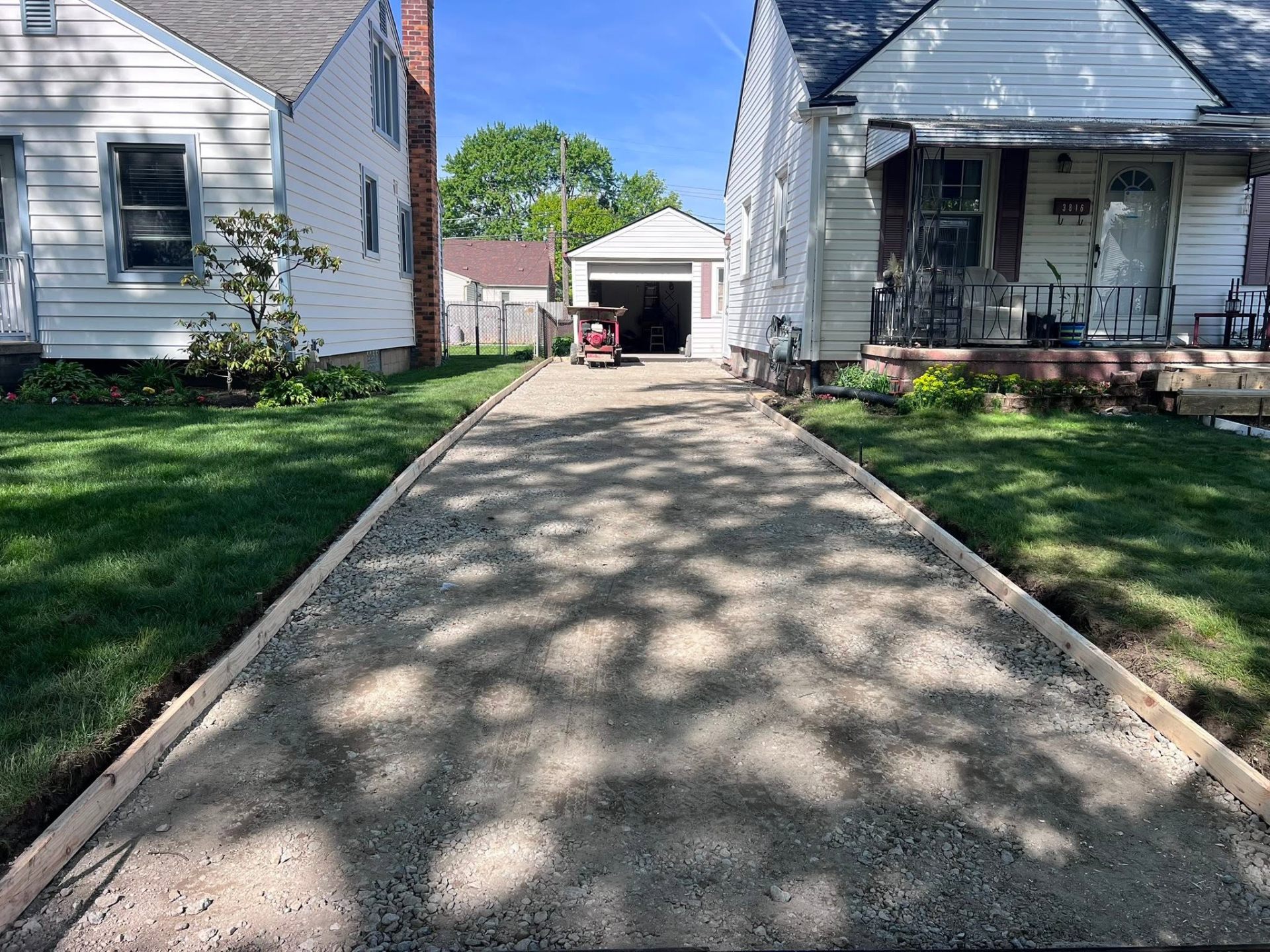 Driveway gravel base with forms set for a fresh pour